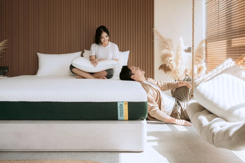 A couple enjoying comfort on a Nosda mattress