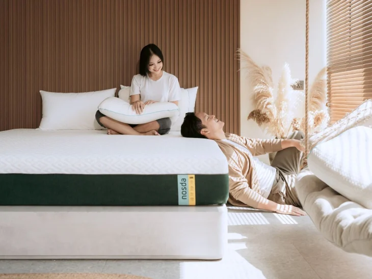 A couple enjoying comfort on a Nosda mattress