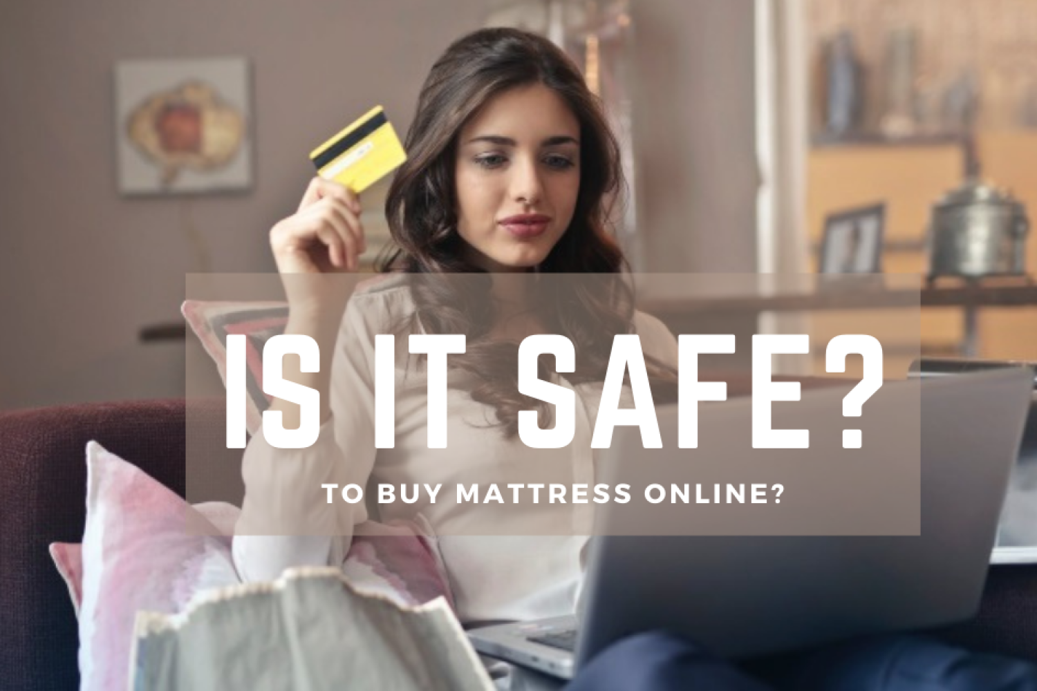 lady holding credit cards and buying mattress online